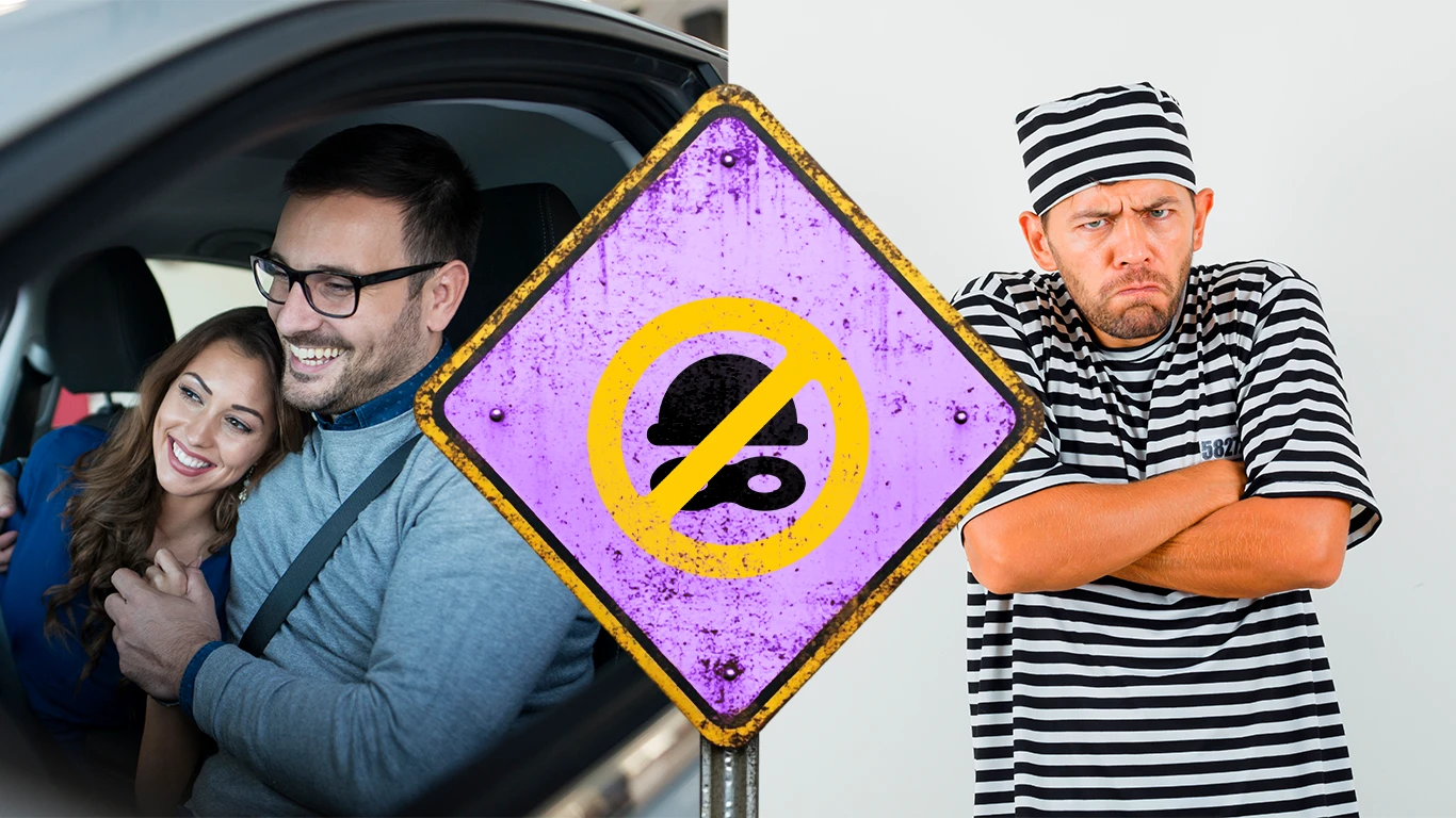 Casal sorridente no carro e sinal de proibição de roubo